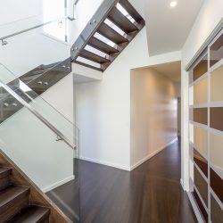 Stair, stained timber, glass balistrade